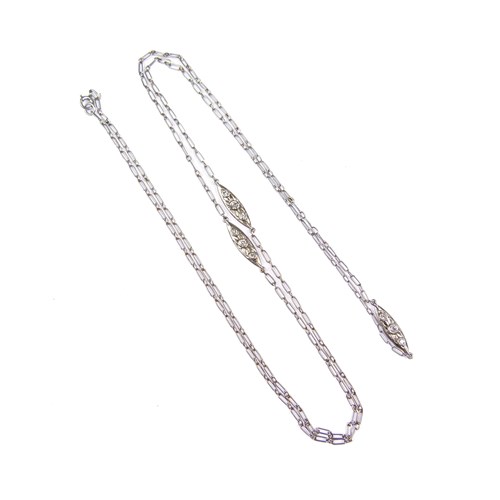 Platinum fetter link long chain necklace spaced by three diamond set cluster links,